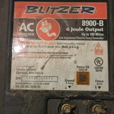 Two electric fence chargers - Blitzer 8900-B and a Hol-Dem model 501