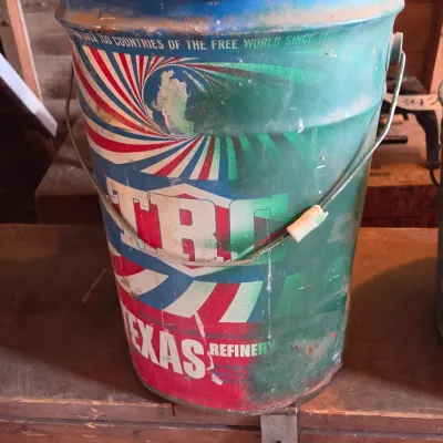 Two vintage metal buckets