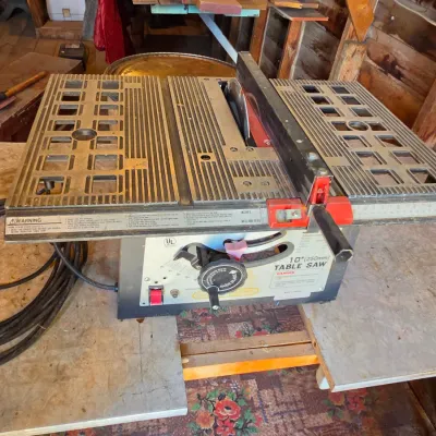 Chicago Electric 10" table saw mounted on vintage chrome legged framica table