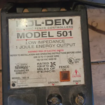 Two electric fence chargers - Blitzer 8900-B and a Hol-Dem model 501