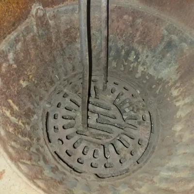 Antique cast-iron "oak-style" pot-belly stove, which reads "BONNY OAK" on the upper front door - appears complete and...