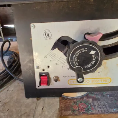 Chicago Electric 10" table saw mounted on vintage chrome legged framica table
