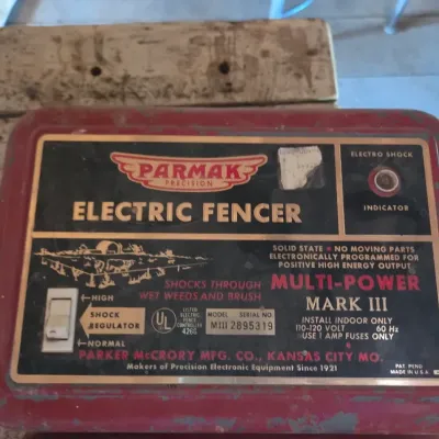 Two electric fence chargers- Paramax Mark III and a Blitzer Scorpion Model 8509 A