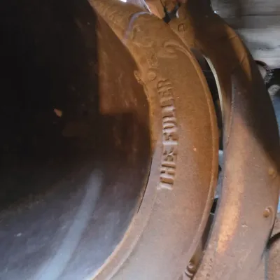 Antique cast-iron "oak-style" pot-belly stove, which reads "BONNY OAK" on the upper front door - appears complete and...