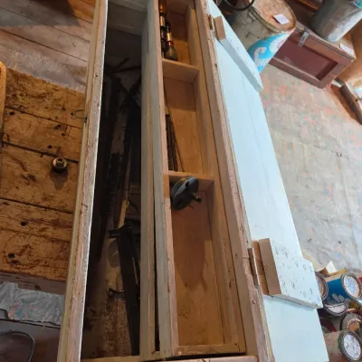 Vintage wood crate toolbox with drawer and an assortment of old tools