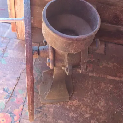 Antique Root-Heath Mfg. Co. "Korn King" No. 2 cast iron grist and corn mill, featuring a hand-crank flywheel marked with...