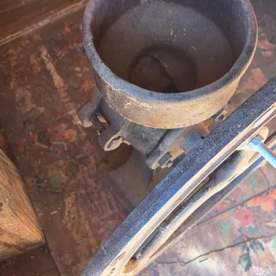 Antique Root-Heath Mfg. Co. "Korn King" No. 2 cast iron grist and corn mill, featuring a hand-crank flywheel marked with...