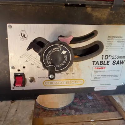 Chicago Electric 10" table saw mounted on vintage chrome legged framica table