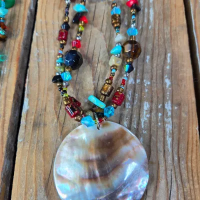Two new beaded necklaces with matching earrings