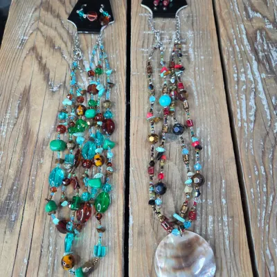Two new beaded necklaces with matching earrings