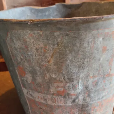 Two vintage metal buckets
