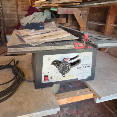 Chicago Electric 10" table saw mounted on vintage chrome legged framica table