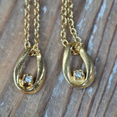 Ladie's Necklaces, cat pin, rings and earrings - Gold toned