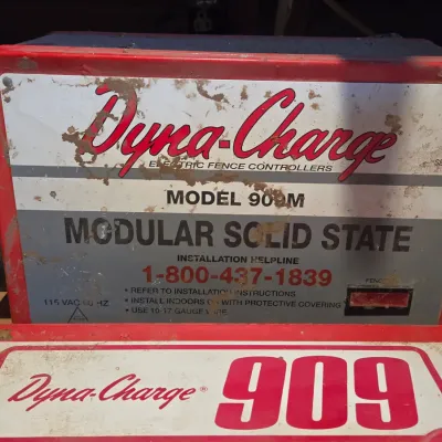 Two Dyna-charge 909 electric fence chargers