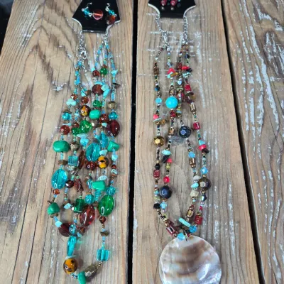 Two new beaded necklaces with matching earrings