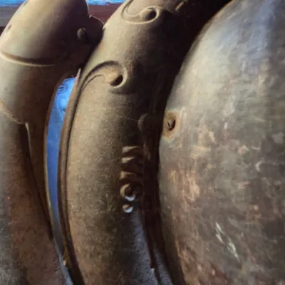 Antique cast-iron "oak-style" pot-belly stove, which reads "BONNY OAK" on the upper front door - appears complete and...