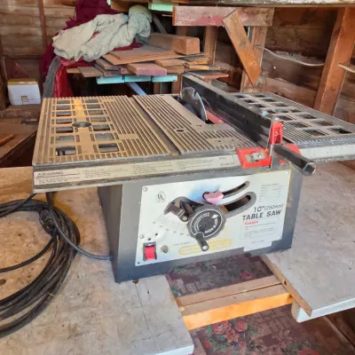 Chicago Electric 10" table saw mounted on vintage chrome legged framica table