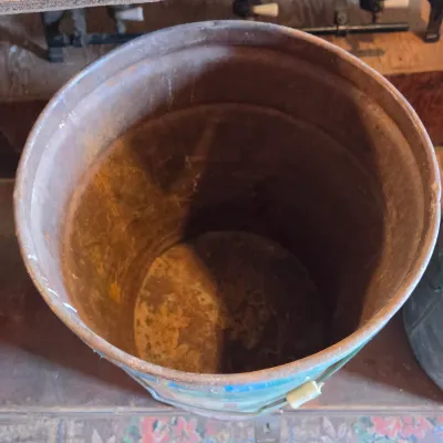 Two vintage metal buckets