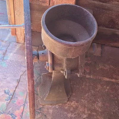 Antique Root-Heath Mfg. Co. "Korn King" No. 2 cast iron grist and corn mill, featuring a hand-crank flywheel marked with...