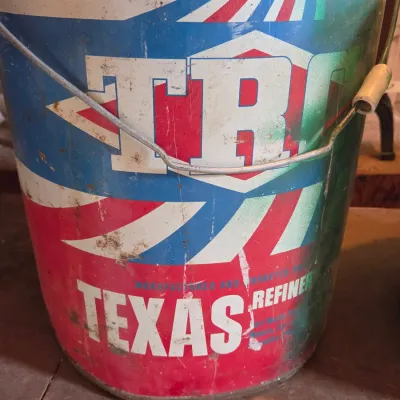 Two vintage metal buckets