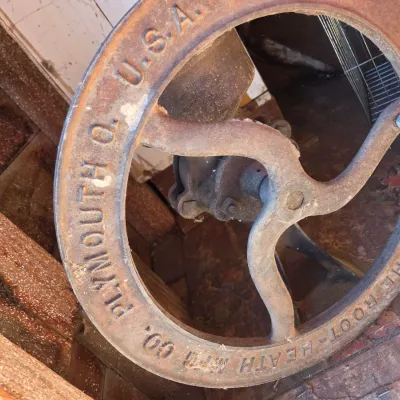 Antique Root-Heath Mfg. Co. "Korn King" No. 2 cast iron grist and corn mill, featuring a hand-crank flywheel marked with...