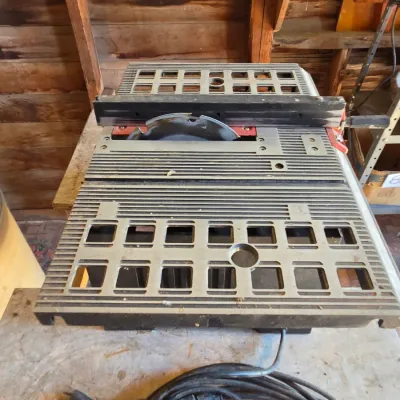 Chicago Electric 10" table saw mounted on vintage chrome legged framica table