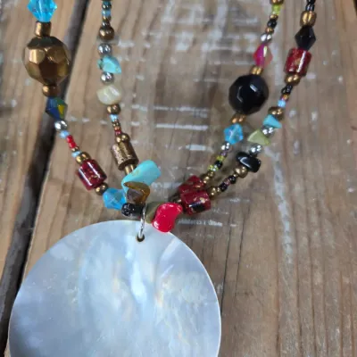 Two new beaded necklaces with matching earrings