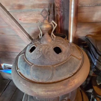 Antique cast-iron "oak-style" pot-belly stove, which reads "BONNY OAK" on the upper front door - appears complete and...