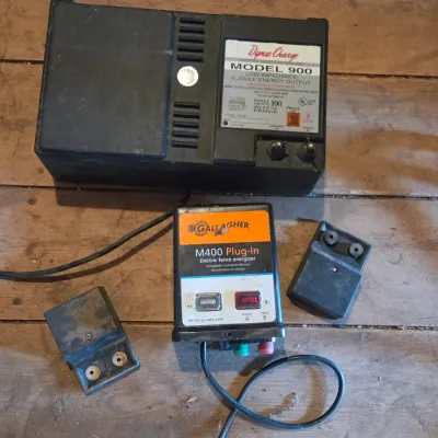 Two electric fence chargers - Dyna charge Model 900 and Gallagher M400 plug-in