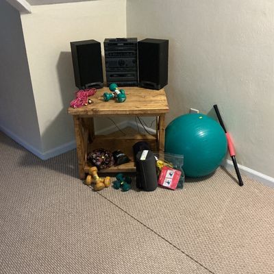 Rustic table, music system, exercise items