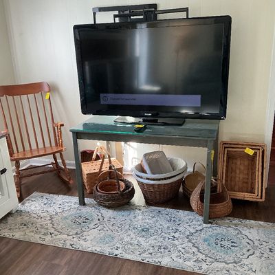 Sale Photo Thumbnail #23: Vintage Windsor style rocking chair, farm table with glass, Philips TV, baskets