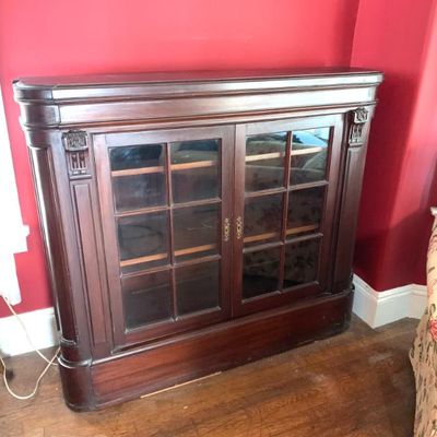 Antique carved mahogony bookcase removed from a now demolished building from the Traveler's Insurance Co.