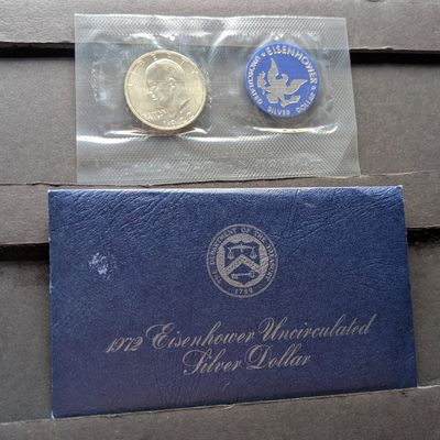 Sale Photo Thumbnail #124: 1972-S Eisenhower Unc. 40% Silver Dollar in OGP