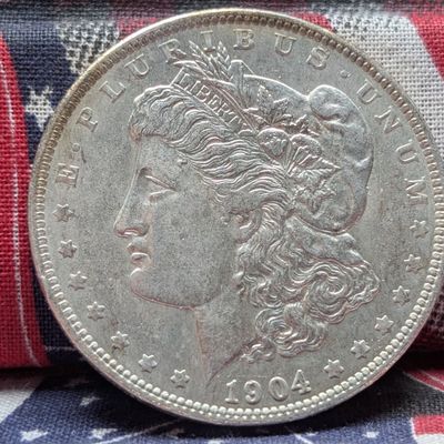 Sale Photo Thumbnail #330: 1904-O Morgan 90% Silver Dollar, 122 Years Old!