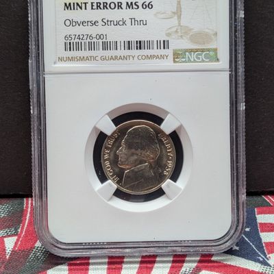 Sale Photo Thumbnail #176: 1938 Jefferson Nickel Obverse Struck Thru NGC MINT ERROR MS 66
