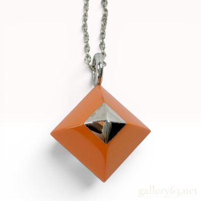 Sale Photo Thumbnail #312: Hermes Medor Cupidon Orange Enamel and Silver Tone Pendant Necklace