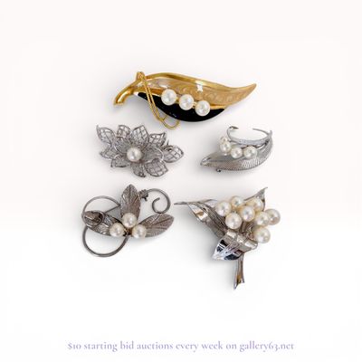 Sale Photo Thumbnail #469: A Collection of Five Vintage Pearl and Botanical Brooches including Mikimoto
