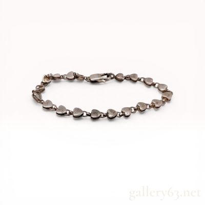 Sale Photo Thumbnail #242: Tiffany & Co. Sterling Silver Puffed Heart Link Bracelet