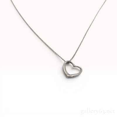 Sale Photo Thumbnail #452: Tiffany and Co Elsa Peretti Sterling Silver Open Heart Pendant Necklace