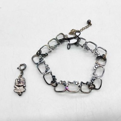 Sale Photo Thumbnail #180: Sanrio Sterling Silver Hello Kitty Link Bracelet and Figural Charm Set