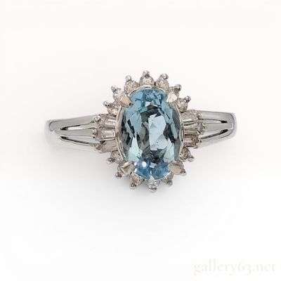 Sale Photo Thumbnail #372: Platinum Oval 1.08ct Blue Topaz and Diamond Halo Ring