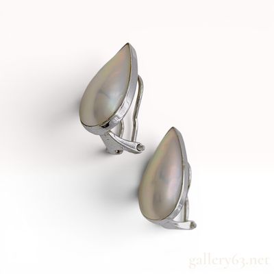 Sale Photo Thumbnail #597: A Pair of Tasaki 14K White Gold and 19.5*9.6mm Pearl Earrings