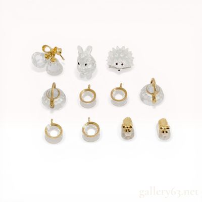 Sale Photo Thumbnail #63: A Collection of Swarovski Faceted Crystal Miniature Figurines and Charms