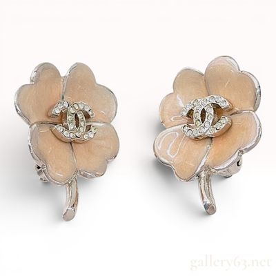 Sale Photo Thumbnail #65: A Pair of Chanel Enamel and Crystal CC Clover Clip-On Earrings