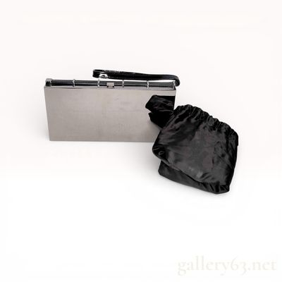 Sale Photo Thumbnail #237: Yves Saint Laurent Mirror-Finish Hard Case Evening Clutch, Silver and Black Patent Leather