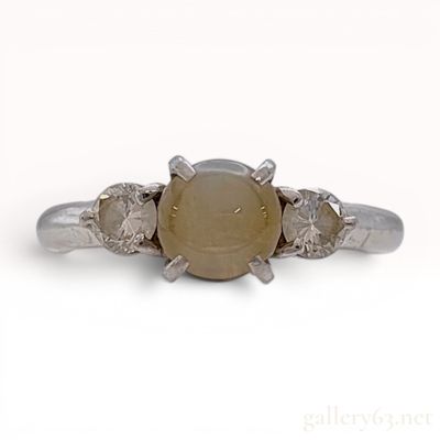 Sale Photo Thumbnail #451: Platinum Chrysoberyl Cat's-Eye and Diamond Three-Stone Ring