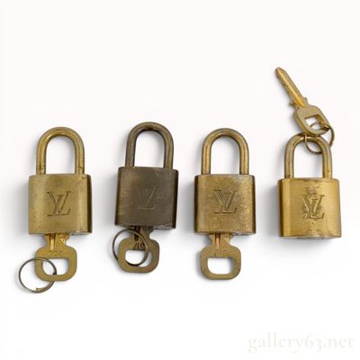 Sale Photo Thumbnail #358: A Set of Four Louis Vuitton Brass Padlocks with Matching Keys