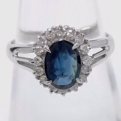 Sale Photo Thumbnail #118: Platinum Sapphire and Diamond Halo Cocktail Ring