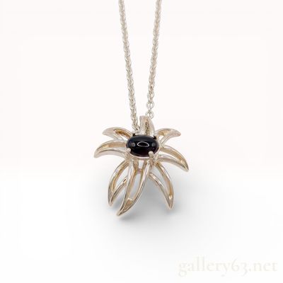 Sale Photo Thumbnail #57: Tiffany and Co. Sterling Silver and Black Onyx Fireworks Pendant Necklace