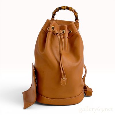 Sale Photo Thumbnail #190: Gucci Vintage Bamboo Leather Drawstring Bucket Backpack